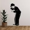 Vinilo Decorativo Charles chaplin inclinado